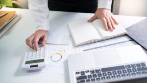 Pick-Up-in-hotels-Auditor-with-notebook-at-desk